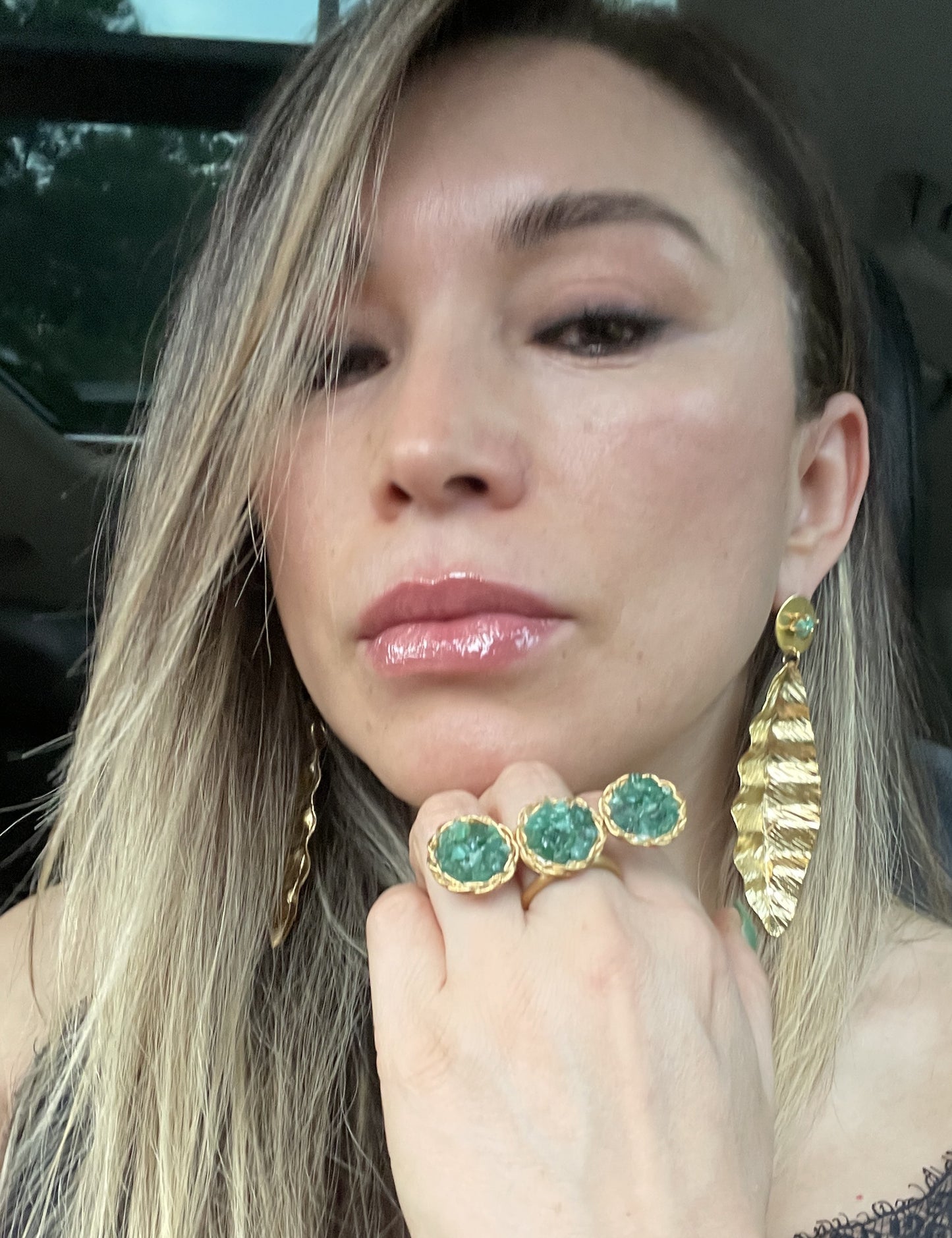 Resin ring with 3 small emerald circles