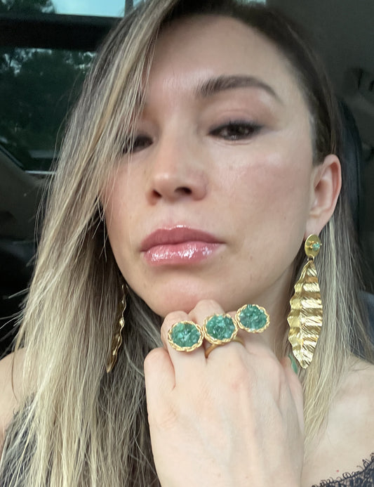 Resin ring with 3 small emerald circles